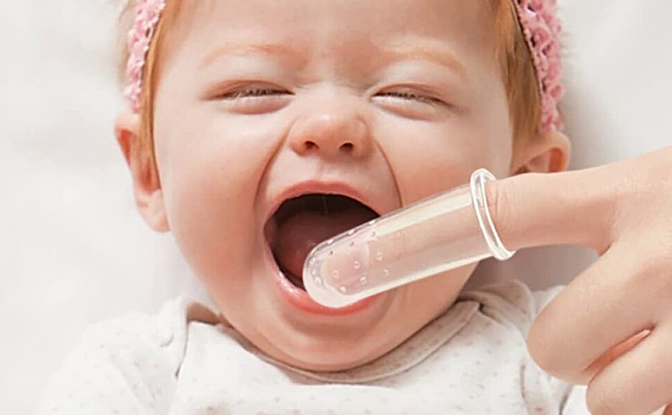 brosse à dents au doigt