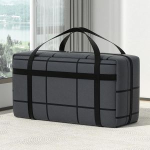 Un sac de rangement extra-large avec des poignées robustes, un tissu durable et un design à carreaux gris et noir.