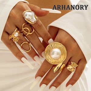 ARHANORY Ensemble de 7 bagues ajustables et superposables pour femme avec perle baroque imitation – Doré