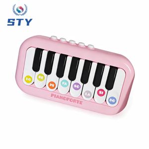 STY Fun & éducatif lumières colorées mini-piano jouet pour enfants (piles AAA 1.5V non incluses, 3+ ans)
