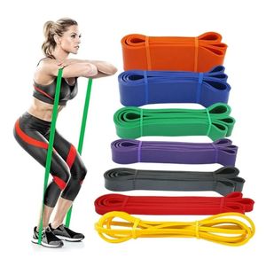 Gamme ultime de bande de fitness de gymnastique de résistance élastique d'exercice de boucles pour le renforcement des muscles.